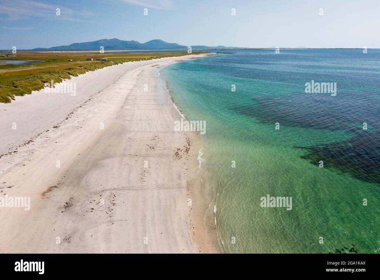 Aerial view from drone of white sands on beach on west coast of island of Benbecula looking south to South Uist, Outer Hebrides, Scotland, UK Stock Photo