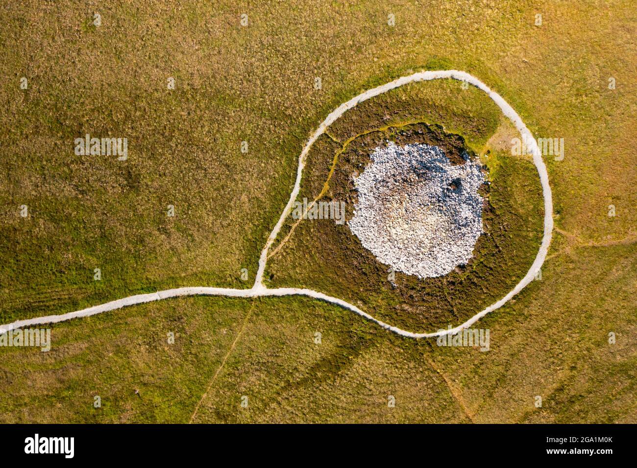 Aerial view from drone of the best preserved Neolithic chambered cairn in the Outer Hebrides at Langass on North Uist, Outer Hebrides, Scotland, UK Stock Photo