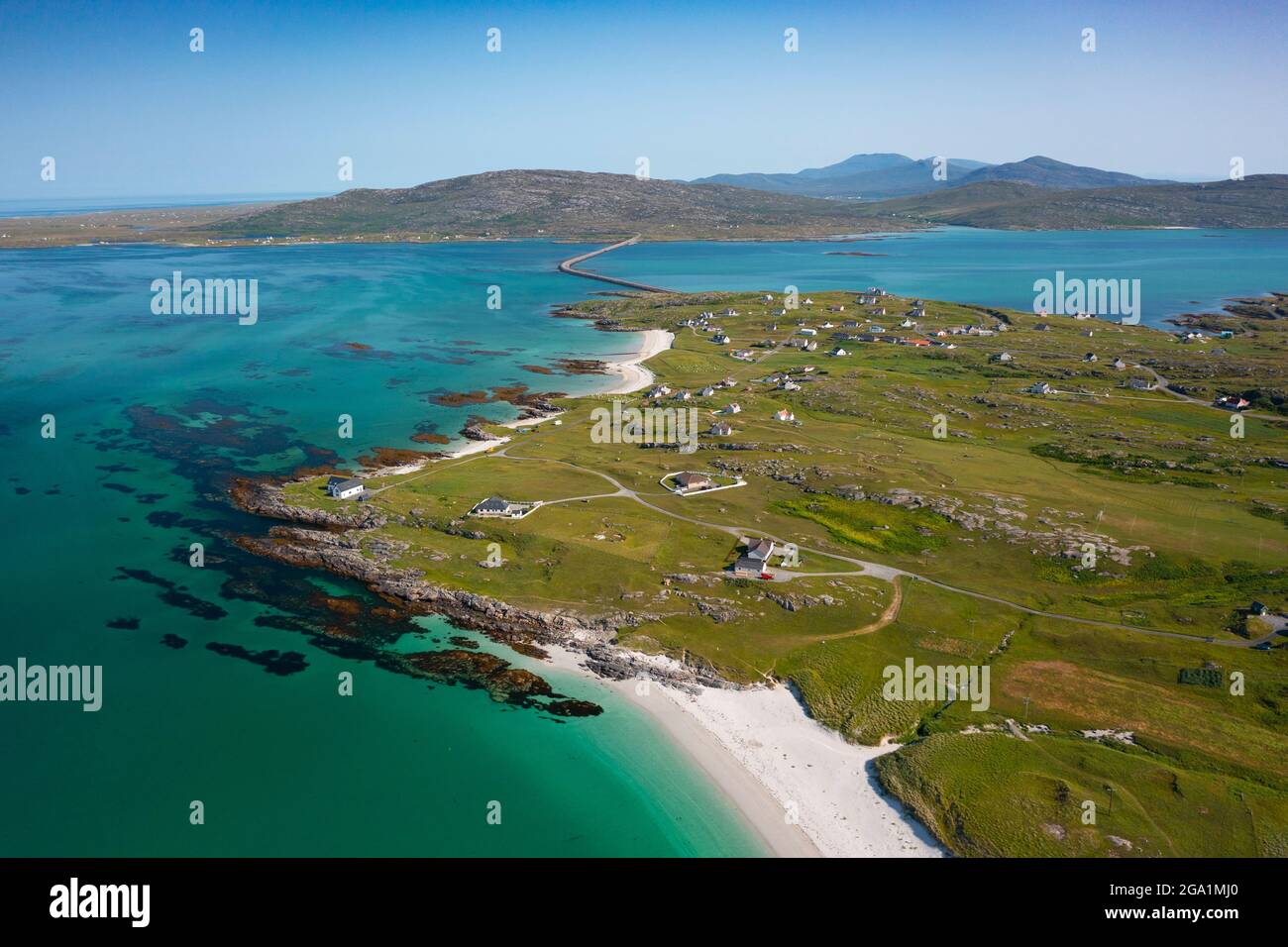 Aerial view from drone of houses in village of Balla on island of Eriskay in the Outer Hebrides, Scotland, UK Stock Photo