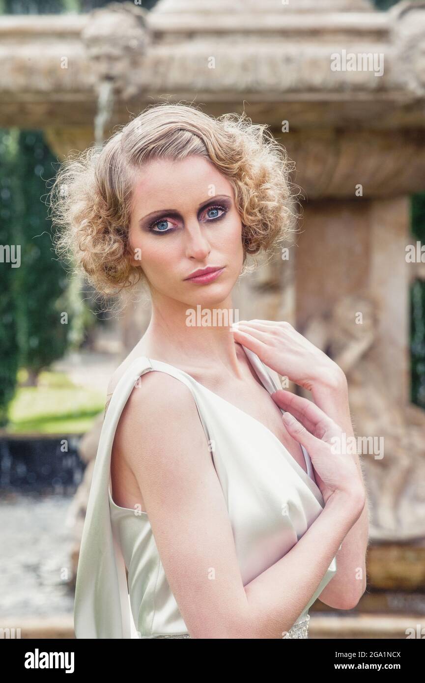Beautiful blonde in white hi-res stock photography and images - Alamy