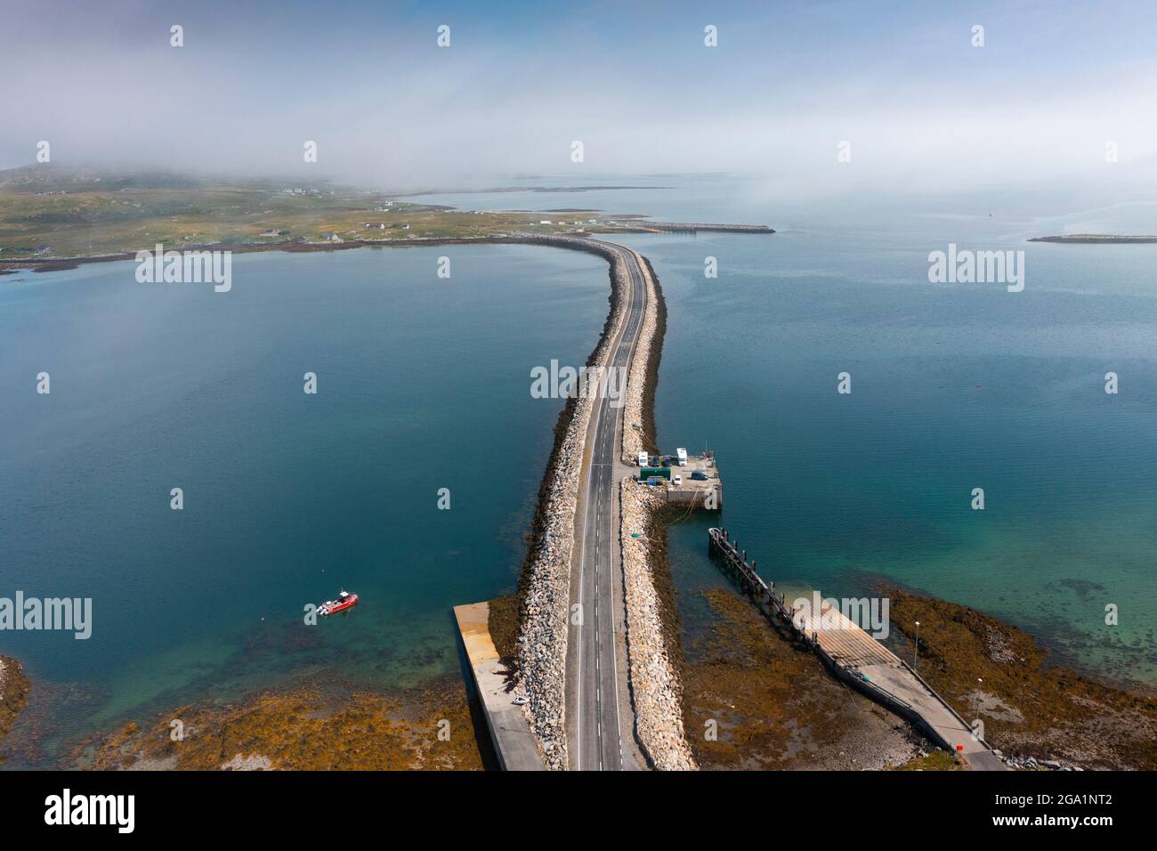 Aerial view from drone of Berneray causeway linking Berneray Island ( top) to North Uist the Outer Hebrides, Scotland, UK Stock Photo