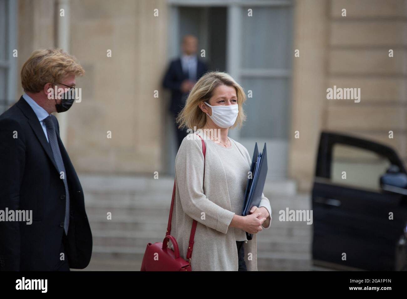 Paris France. 28th July 2021. Marc Fesneau and French Ecological Transition Minister Barbara Pompili with Polene handbag leaving after taking part in the Council of Ministers meeting at The Elysee Pre...
