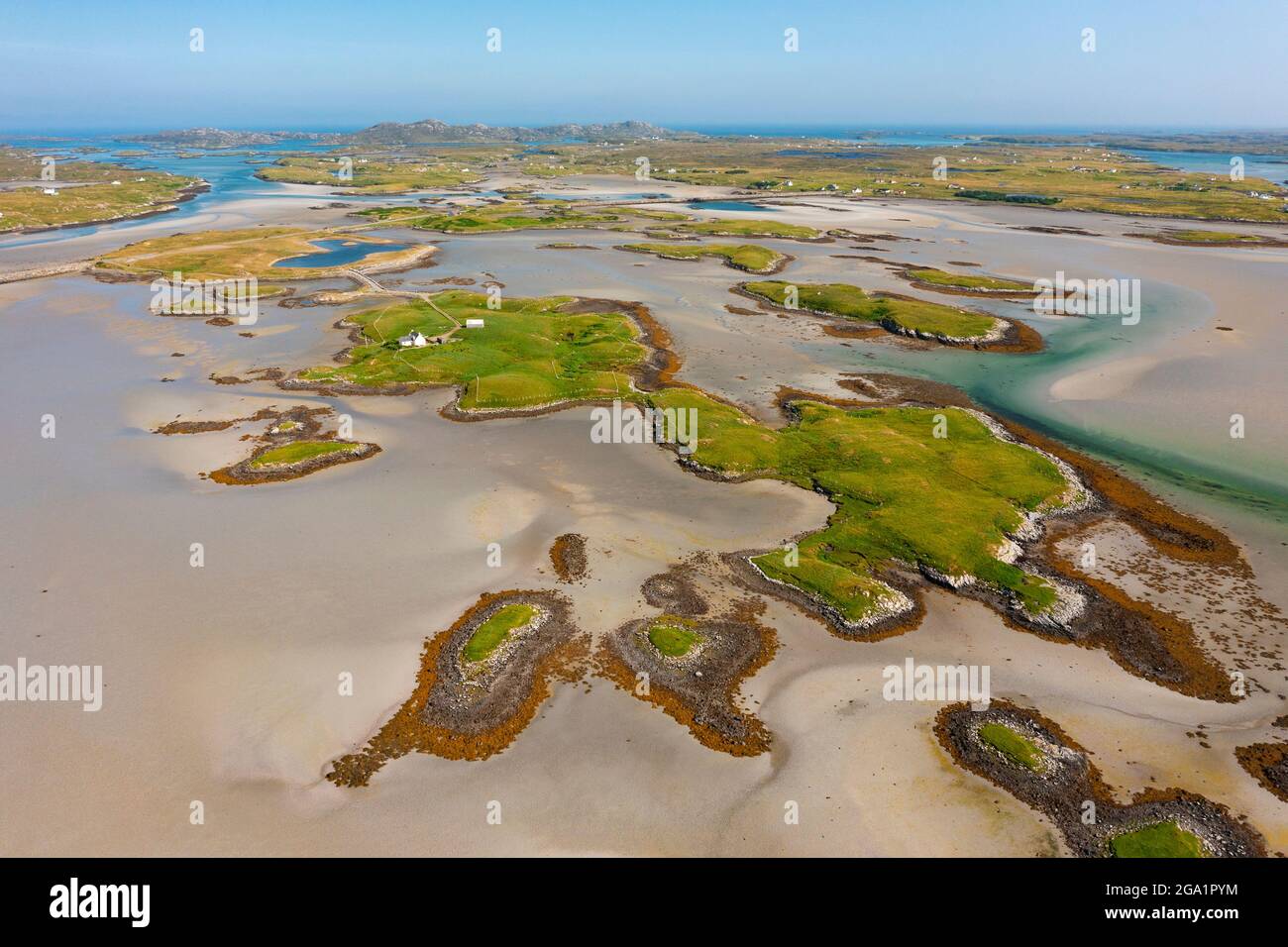Aerial view from drone of  small islands on Oitir Mhor estuary on Benbecula in  the Outer Hebrides, Scotland, UK Stock Photo