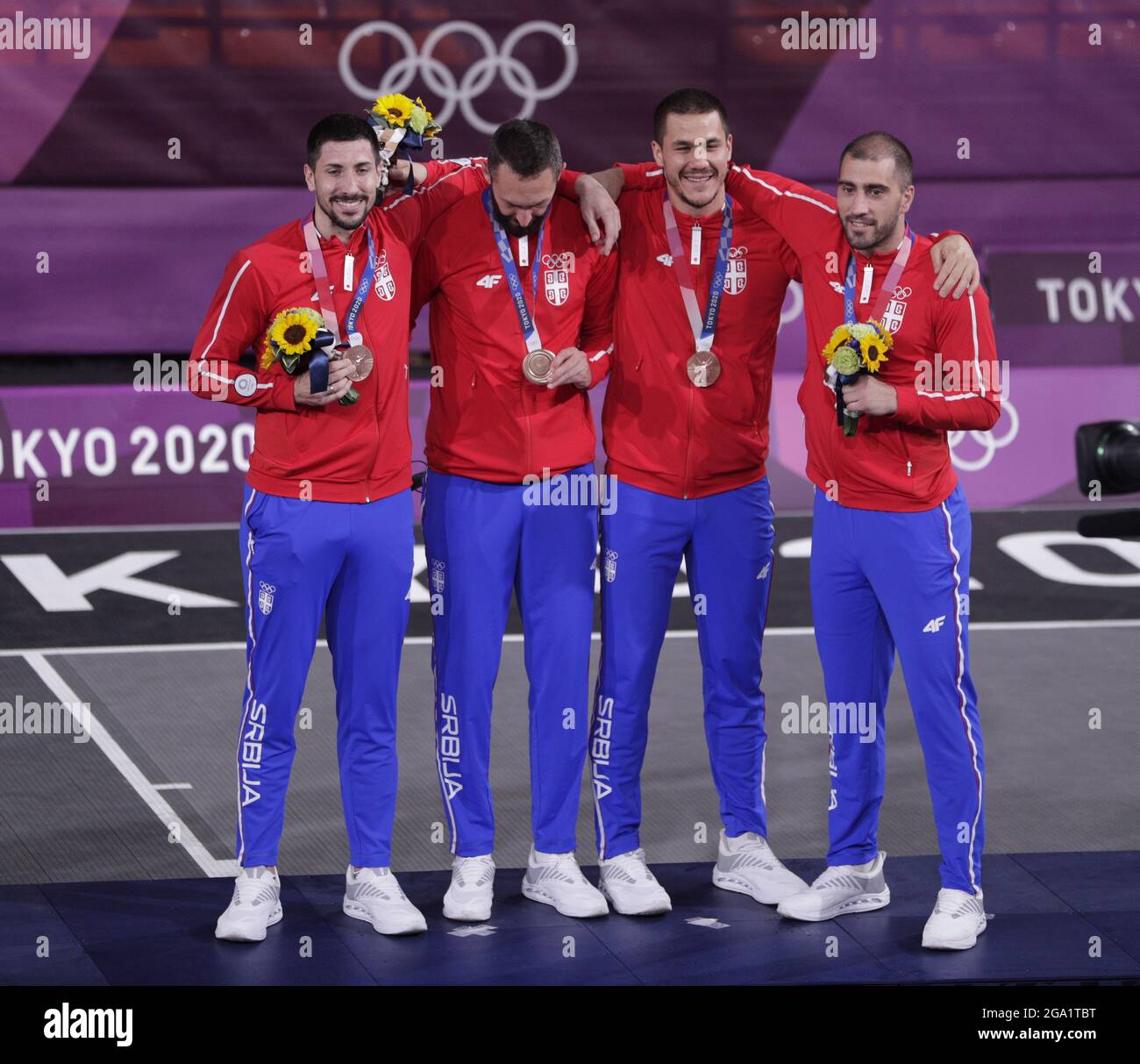 Tokyo, Japan. 28th July, 2021. Bronze medalists from Serbia pose on the podium after defeating Belgium in the Men's 3X3 Basketball at the Tokyo Summer Olympics in Tokyo, Japan, on Wednesday, July 28, 2021. This was the first year 3X3 basketball was an Olympic event. Photo by Bob Strong/UPI. Credit: UPI/Alamy Live News Stock Photo