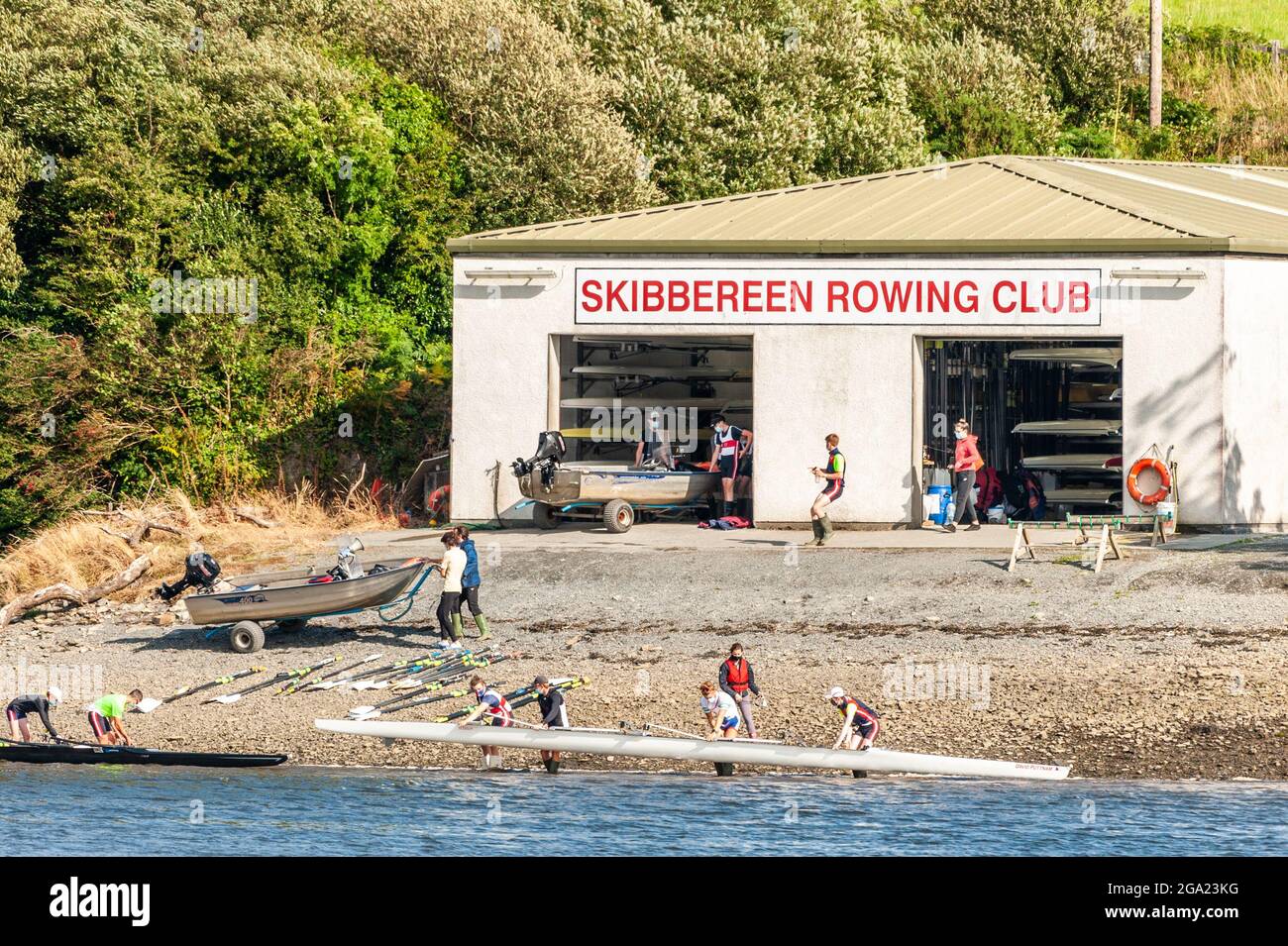 Skibbereen, West Cork, Ireland. 28th July, 2021. People of Skibbereen town were today preparing to support the Irish rowers competing in tomorrow morning's Mens Lightweight Double Sculls Final. Rowers Fintan McCarthy and Skibbereen's Paul O'Donovan go for gold at 1.50am. Rowers at Skibbereen Rowing Club, where Paul O'Donovan was brought up with rowing, were starting a training session, perhaps hoping to be Olympians in the future. Credit: AG News/Alamy Live News Stock Photo
