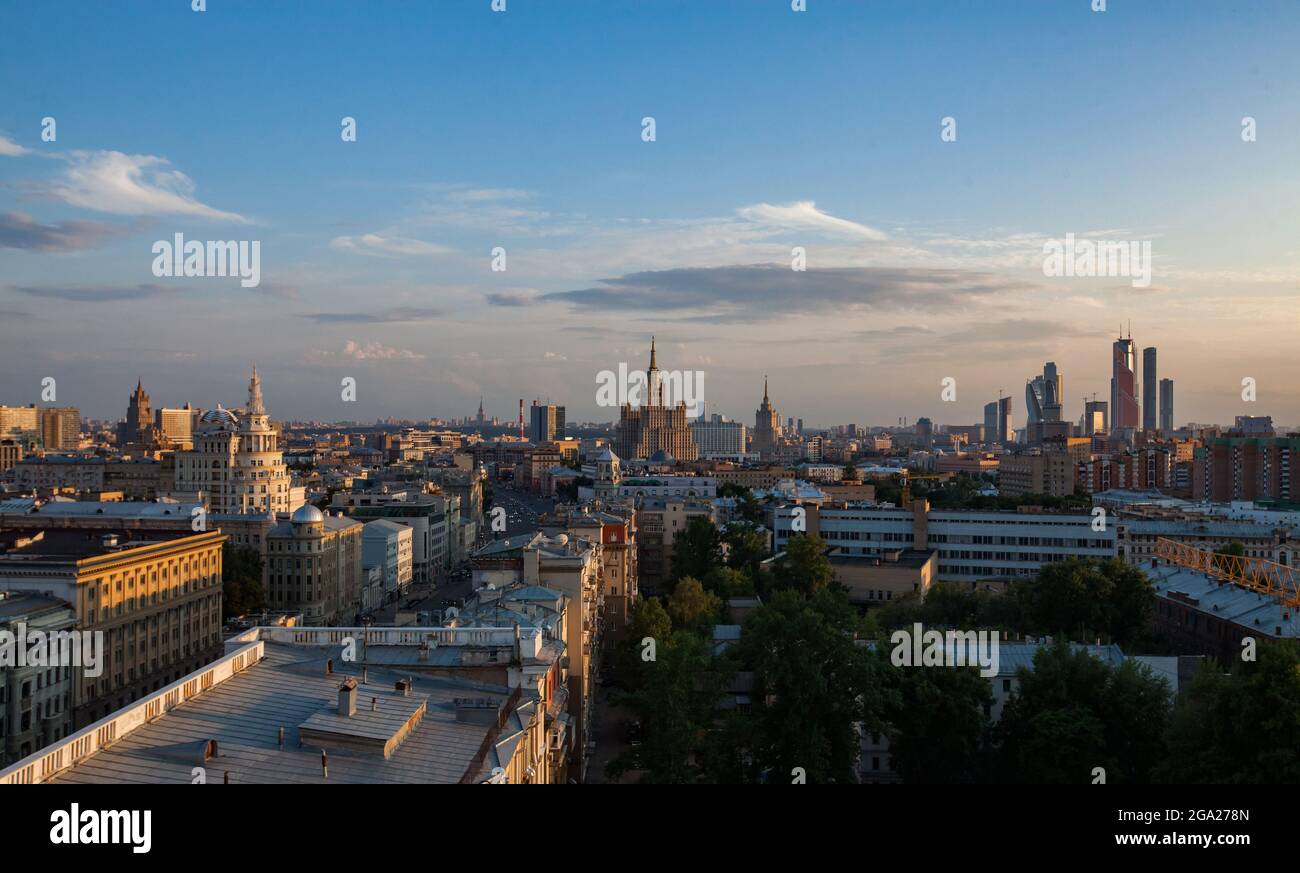 Panoramic cityscape on blue sky with clouds on sunset. Moscow historical center or downtown. Birds-eye view. Stock Photo