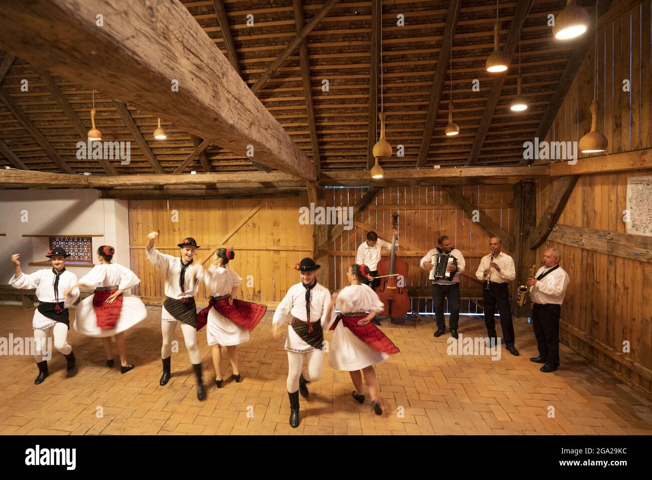 Village Barn Dance in a barn in Viscri Village, Transylvania, Romania Stock Photo