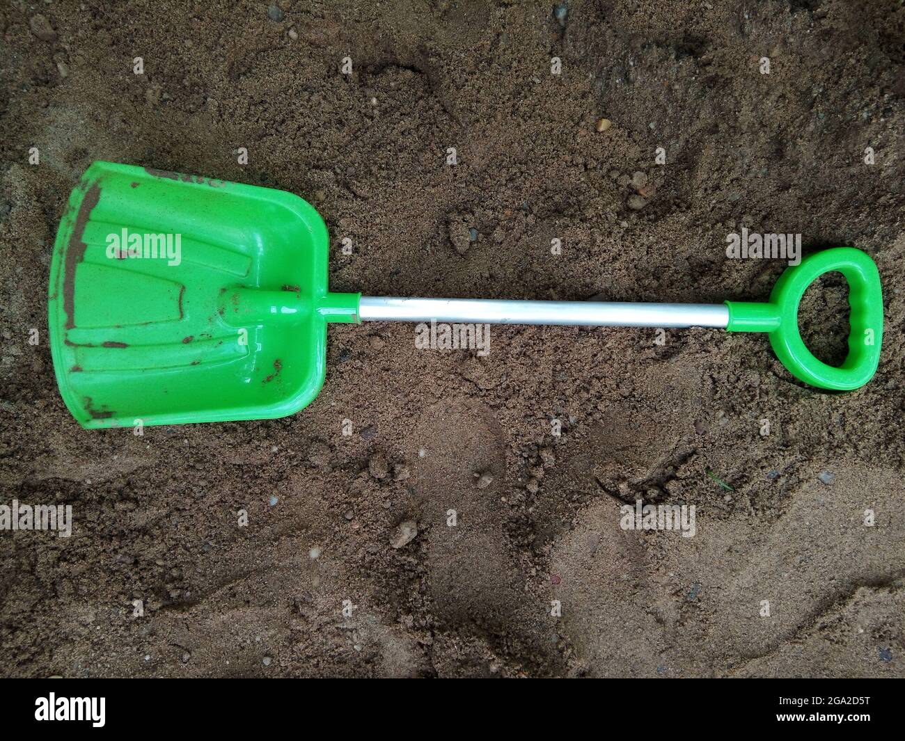 plastic shovel on the sand Stock Photo - Alamy