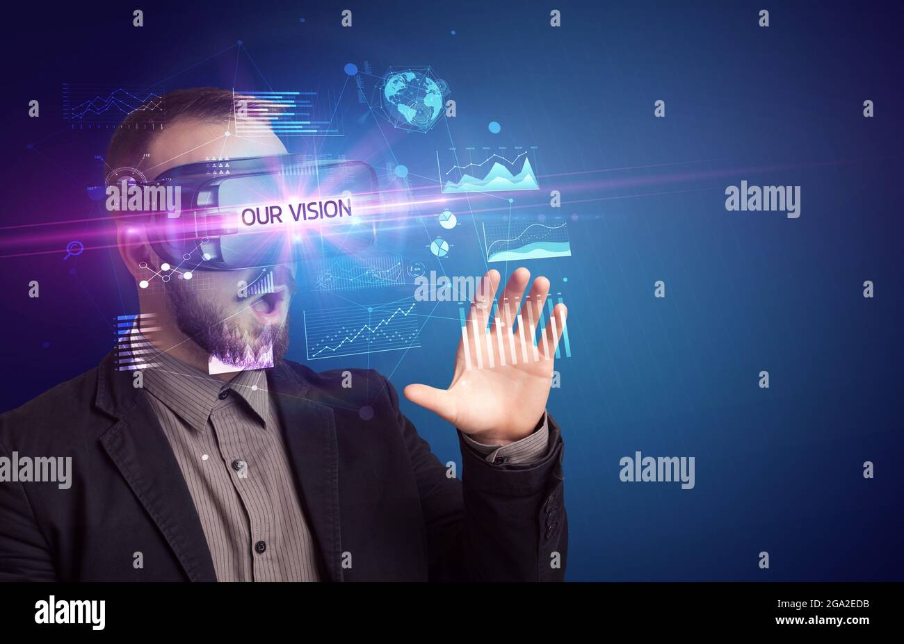 Businessman looking through Virtual Reality glasses Stock Photo