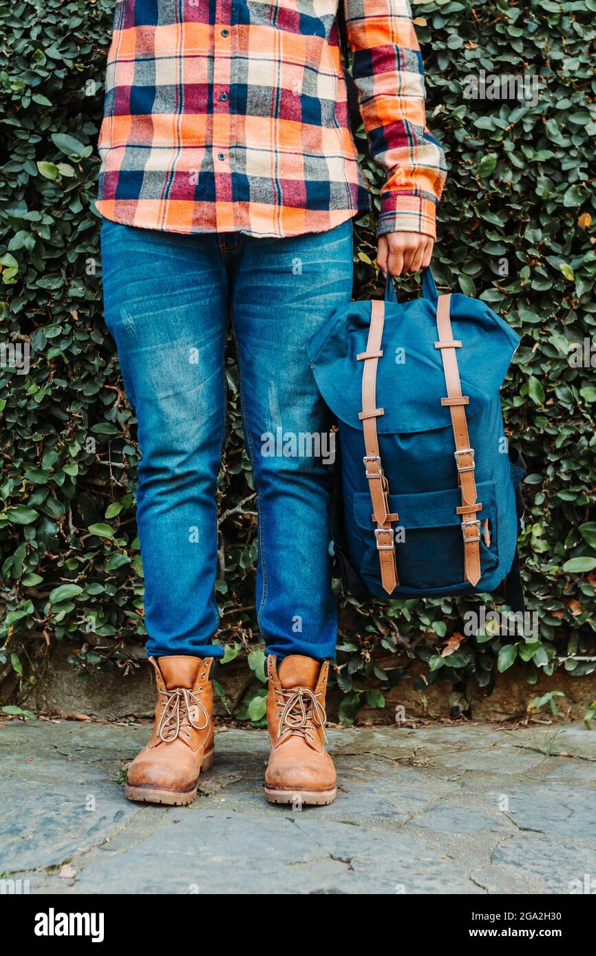 adult hipster person wearing jeans 