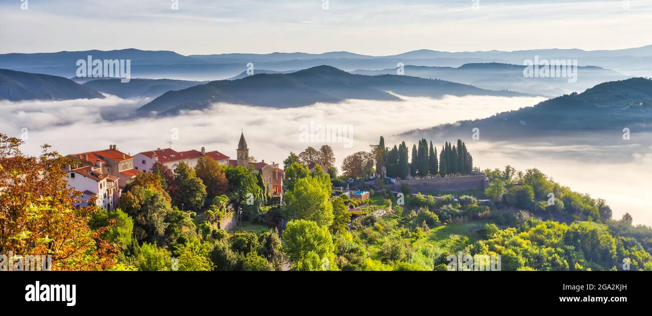 Hills in the skyline and the village of Motovun, Croatia; Motovun, Croatia Stock Photo