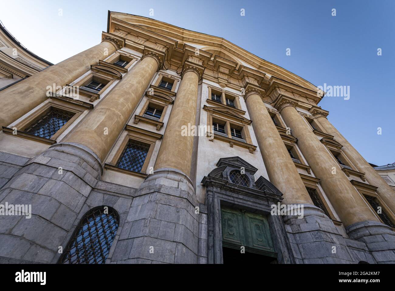 Close-up view of the exterior facade of the Ursuline Church of the Holy Trinity, a parish church in the capital city; Ljubljana, Slovenia Stock Photo