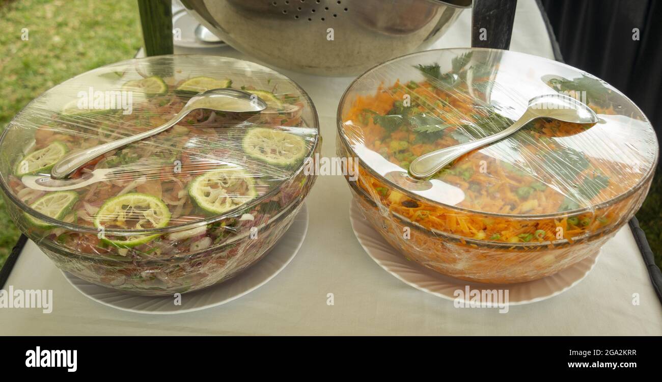 Two bowls of salads wrapped with plastic wrap Stock Photo Alamy