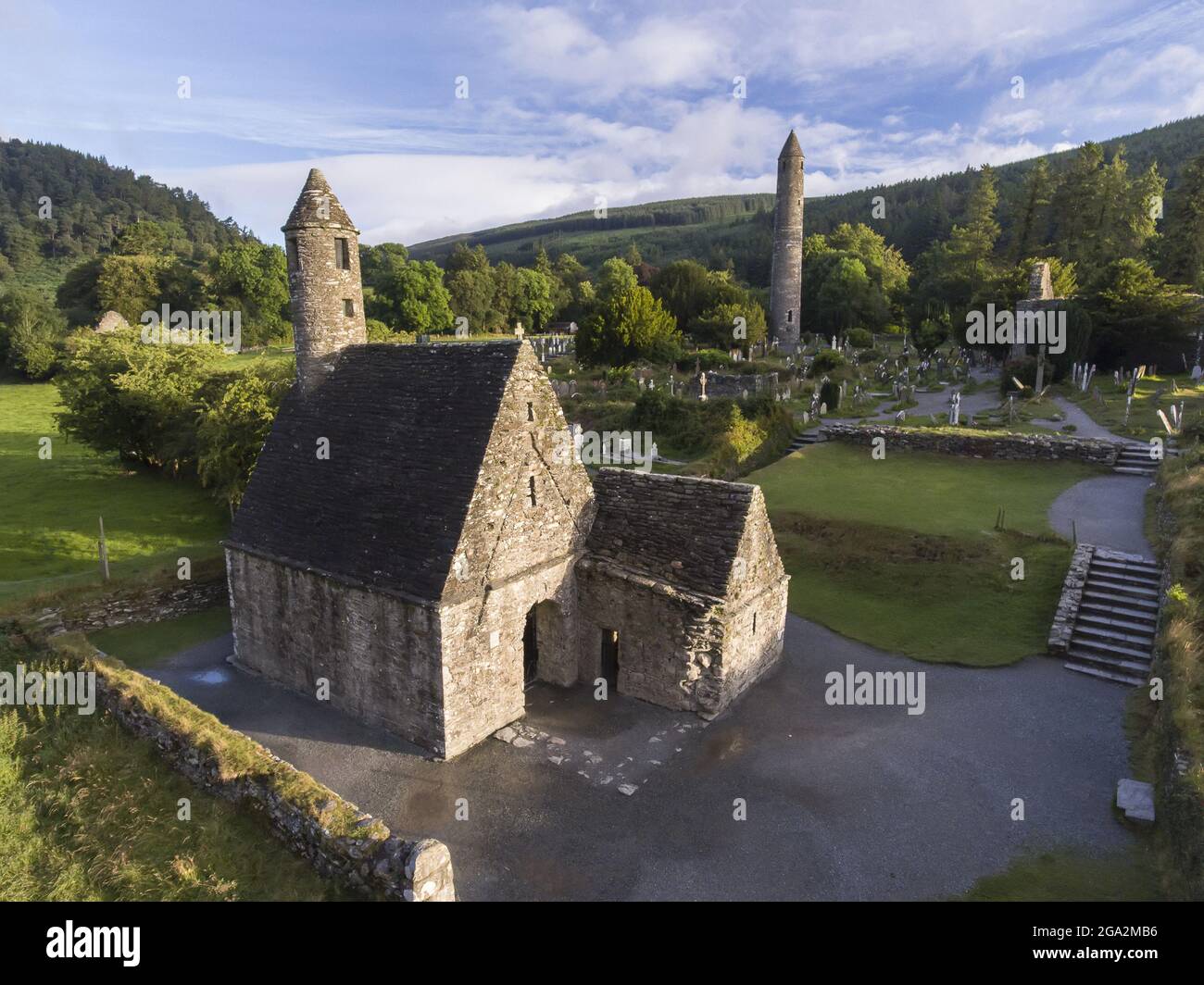 St Kevin's Church at Glendalough (or The valley of the Two Lakes) is the site of an early Christian monastic settlement nestled in the Wicklow Moun... Stock Photo