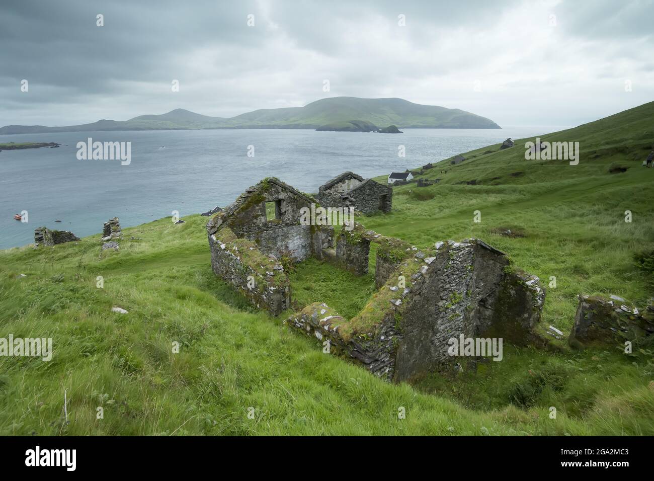 Stone ruins of the deserted village on Great Blasket Island (famous for 19th and 20th Century Irish Language Memoirs) Stock Photo