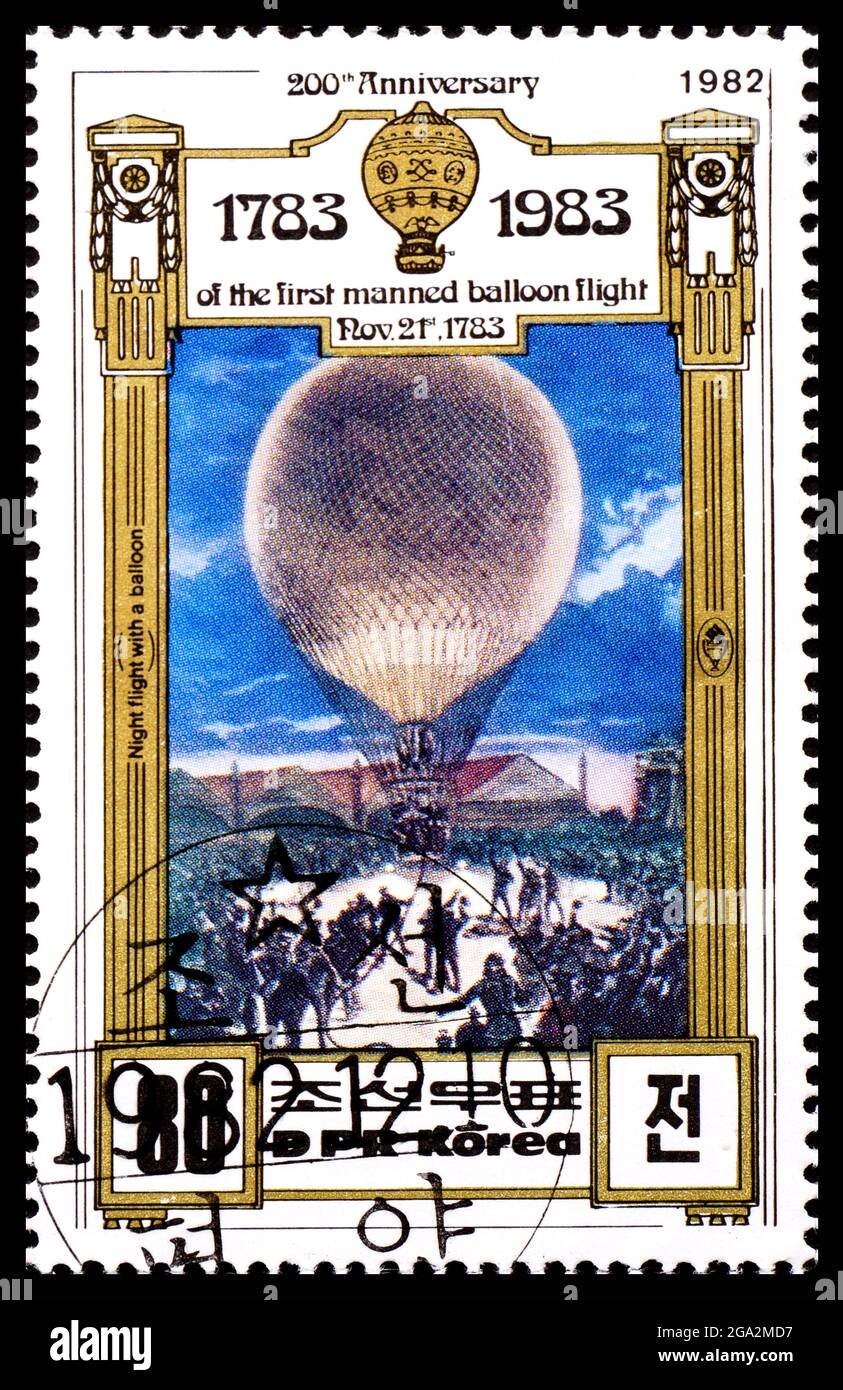 DPR, KOREA - CIRCA 1982: A postage stamp from Korea showing Night flight with a balloon Stock Photo