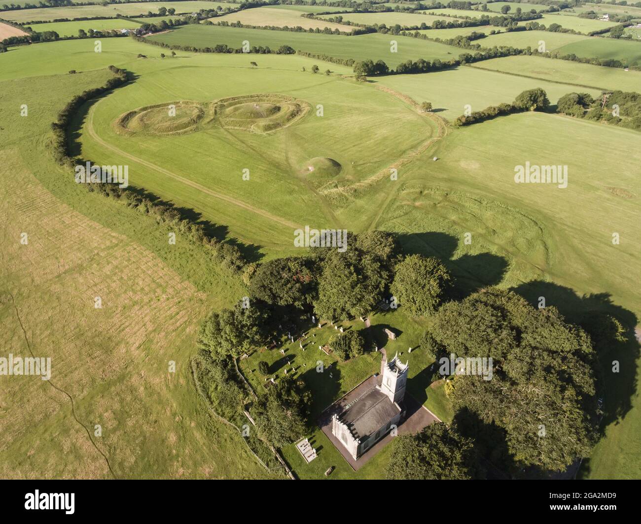 Aerial view of the Hill of Tara, an ancient burial and ceremonial site including an  oval enclosure, known as Rath na Riogh (Fortress of the Kings)... Stock Photo