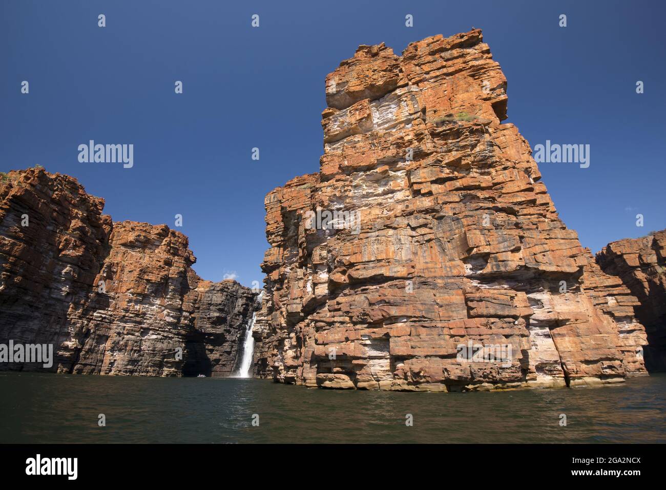 Craggy sandstone cliffs in the Springtime at the King George River waterfalls in the Kimberley Region; Western Australia, Australia Stock Photo