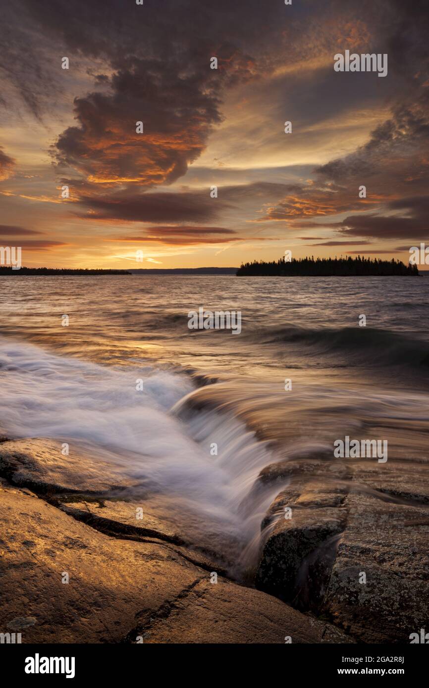 Sunrise reflections on Lake Superior; Thunder Bay, Ontario, Canada