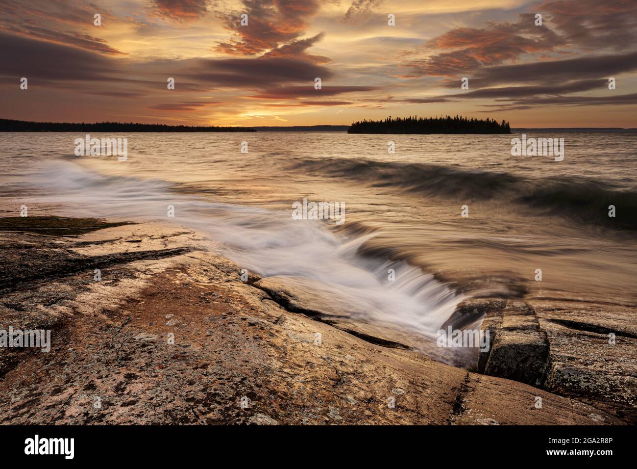 Sunrise reflections on Lake Superior; Thunder Bay, Ontario, Canada