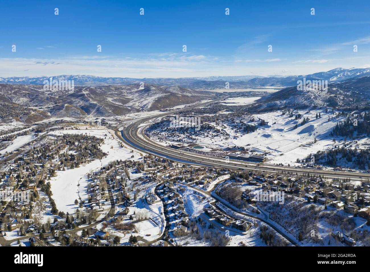 Aerial View over Park City after a winter snowfall, famous for its ski resorts and ; Park City, Summit County, Utah, United States of America Stock Photo