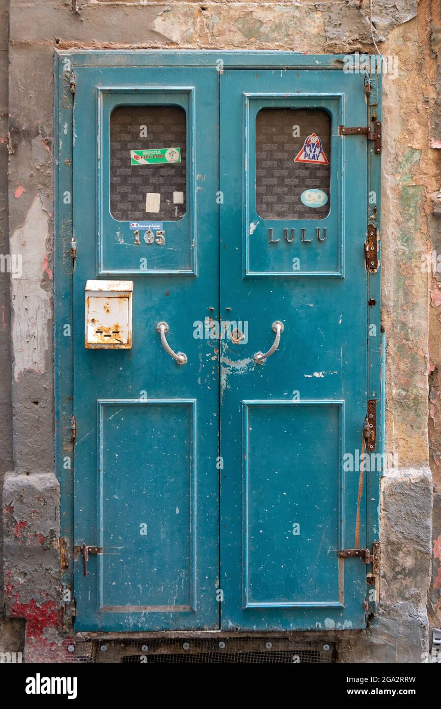 Doorway entrance on an old sandstone block building in Malta. Stock Photo
