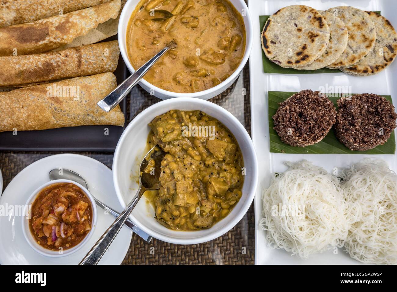 Typical Sri Lankan breakfast with string hoppers, Columbo, Sri Lanka; Wayikkal, Puttalam