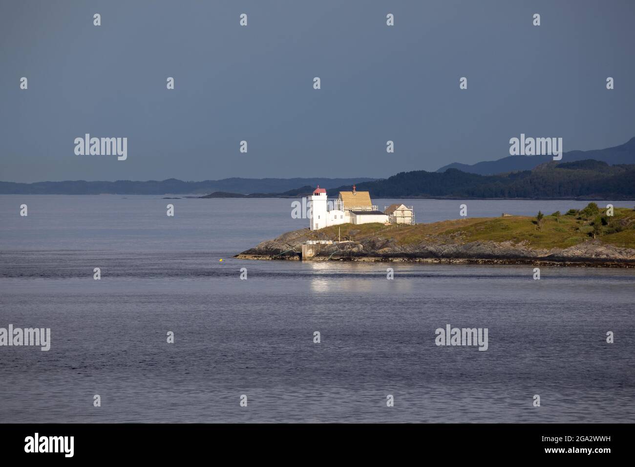 Terningen Lighthouse on a remote island in the Municipality of Hitra near the mouth of the Hemnfjorden in the Western Fjords of Norway Stock Photo