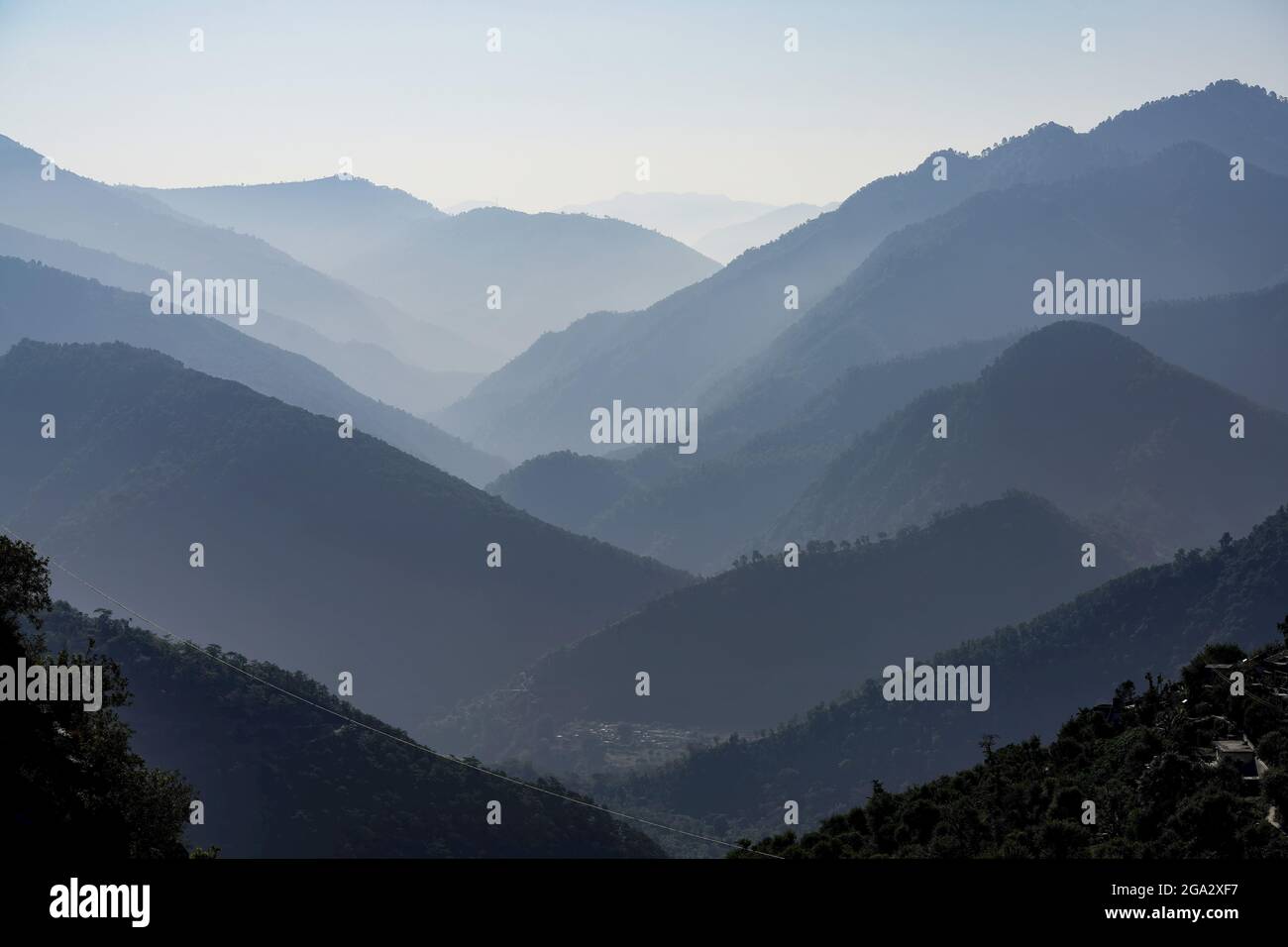 Silhouetted view of the foothills of the Himalayas between the Rishikesh and Devprayag in the Ganges Valley; Uttarakhand, India Stock Photo