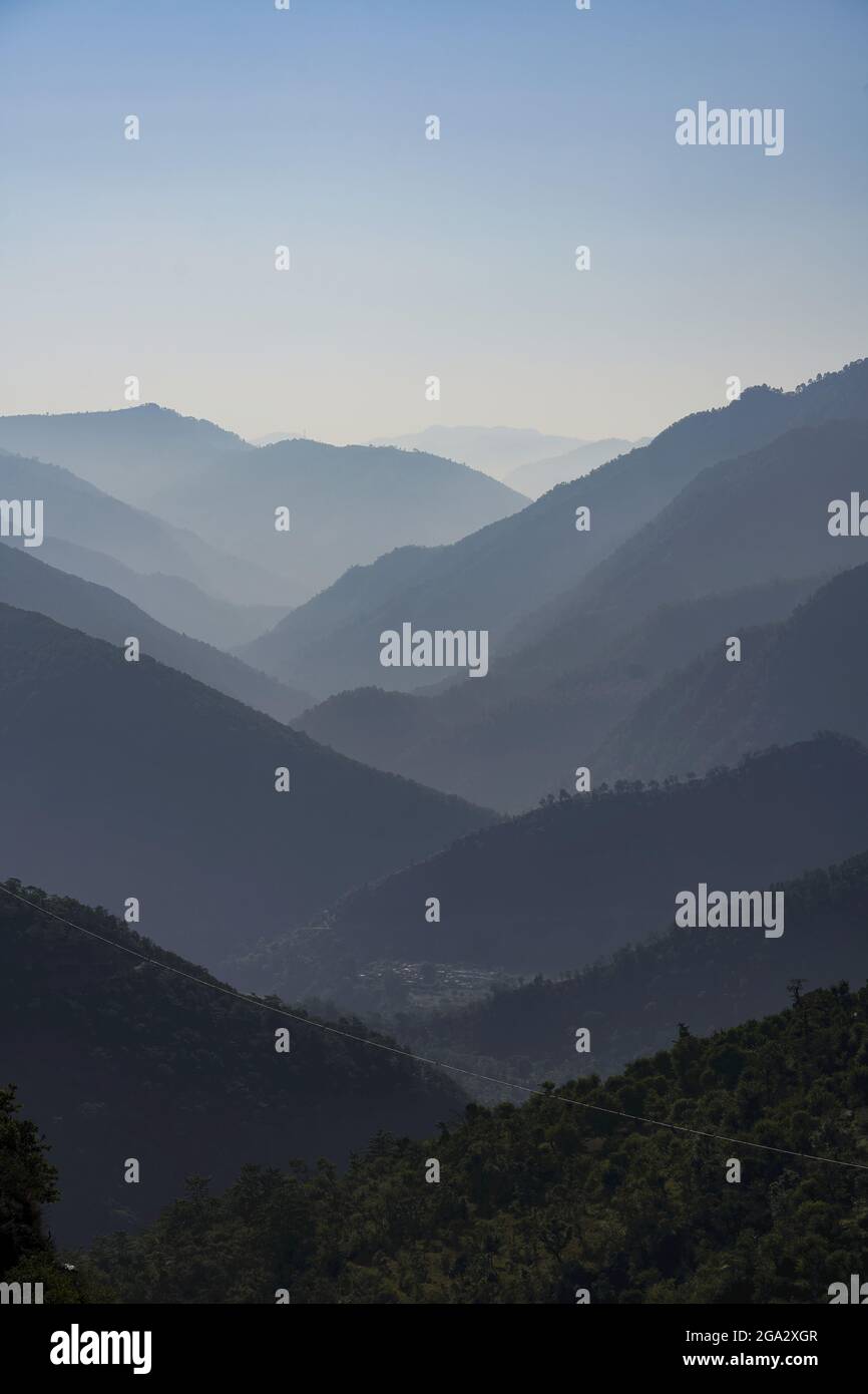 Silhouetted view of the foothills of the Himalayas between the Rishikesh and Devprayag in the Ganges Valley; Uttarakhand, India Stock Photo