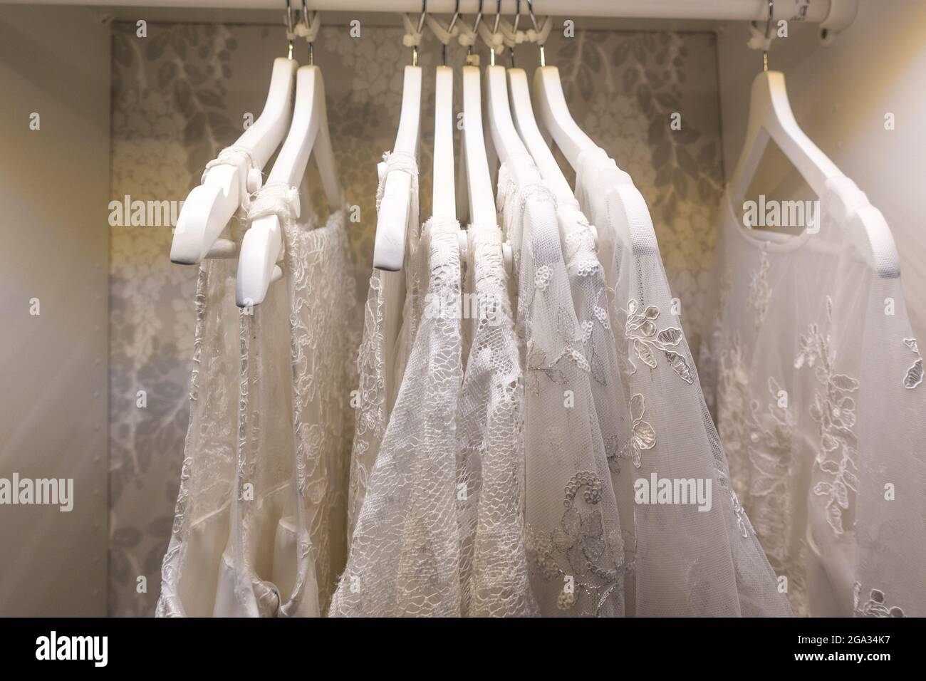 Wedding dress in acupboard Stock Photo