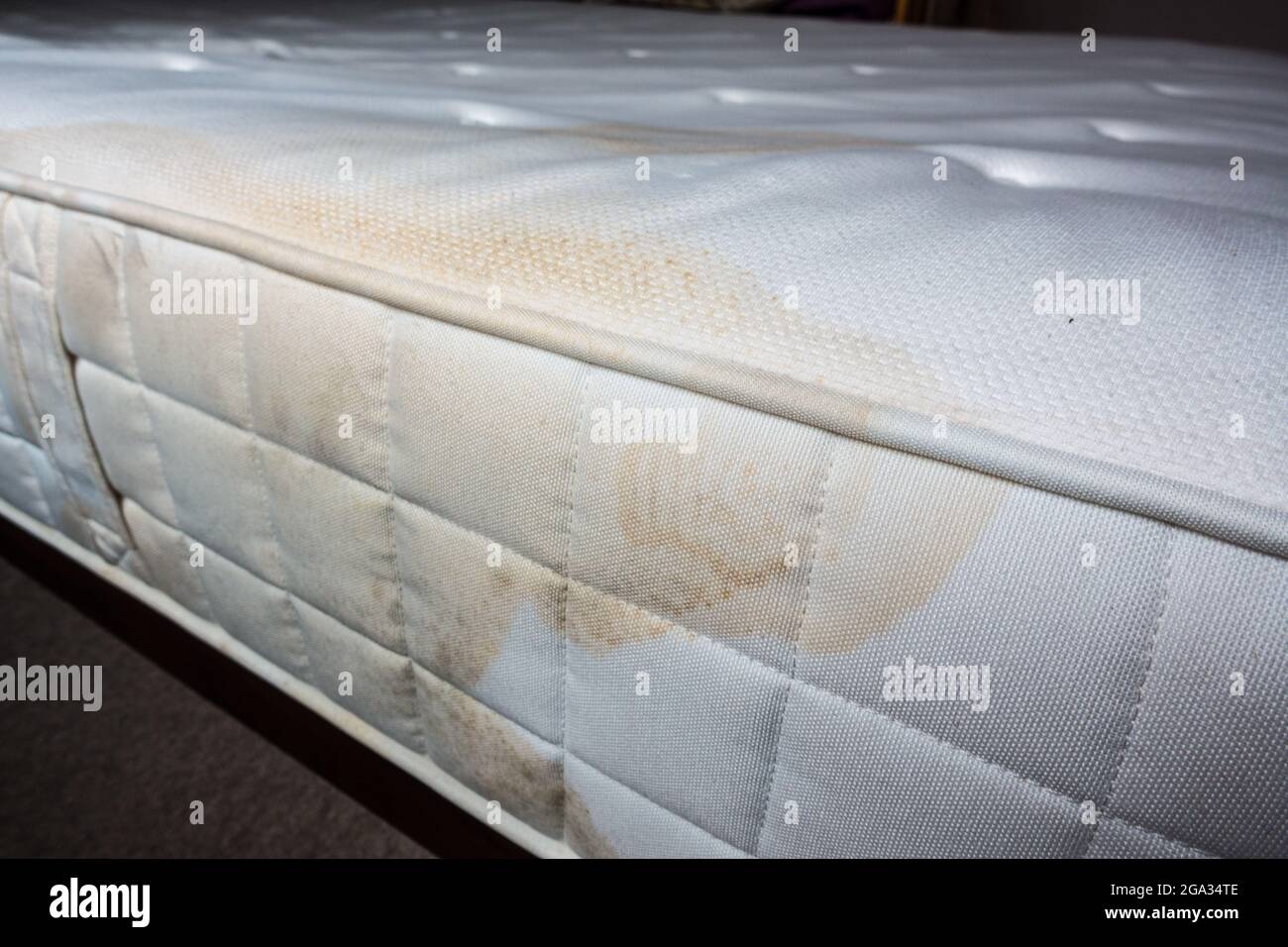 Soiled stains on white mattress Stock Photo Alamy