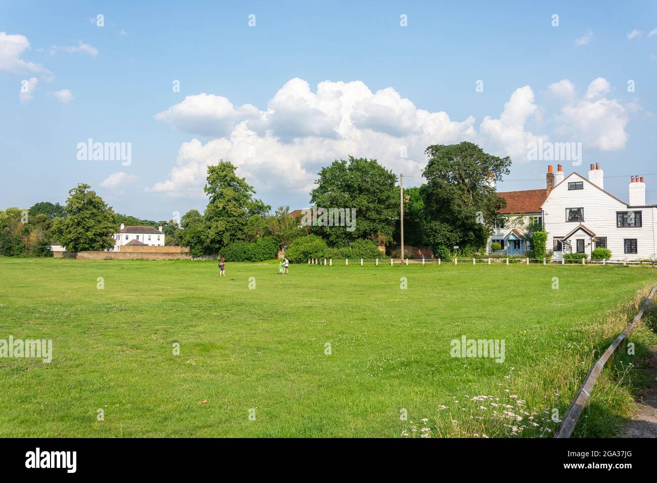 Children playing park grass green open spaces riverside green wa hires