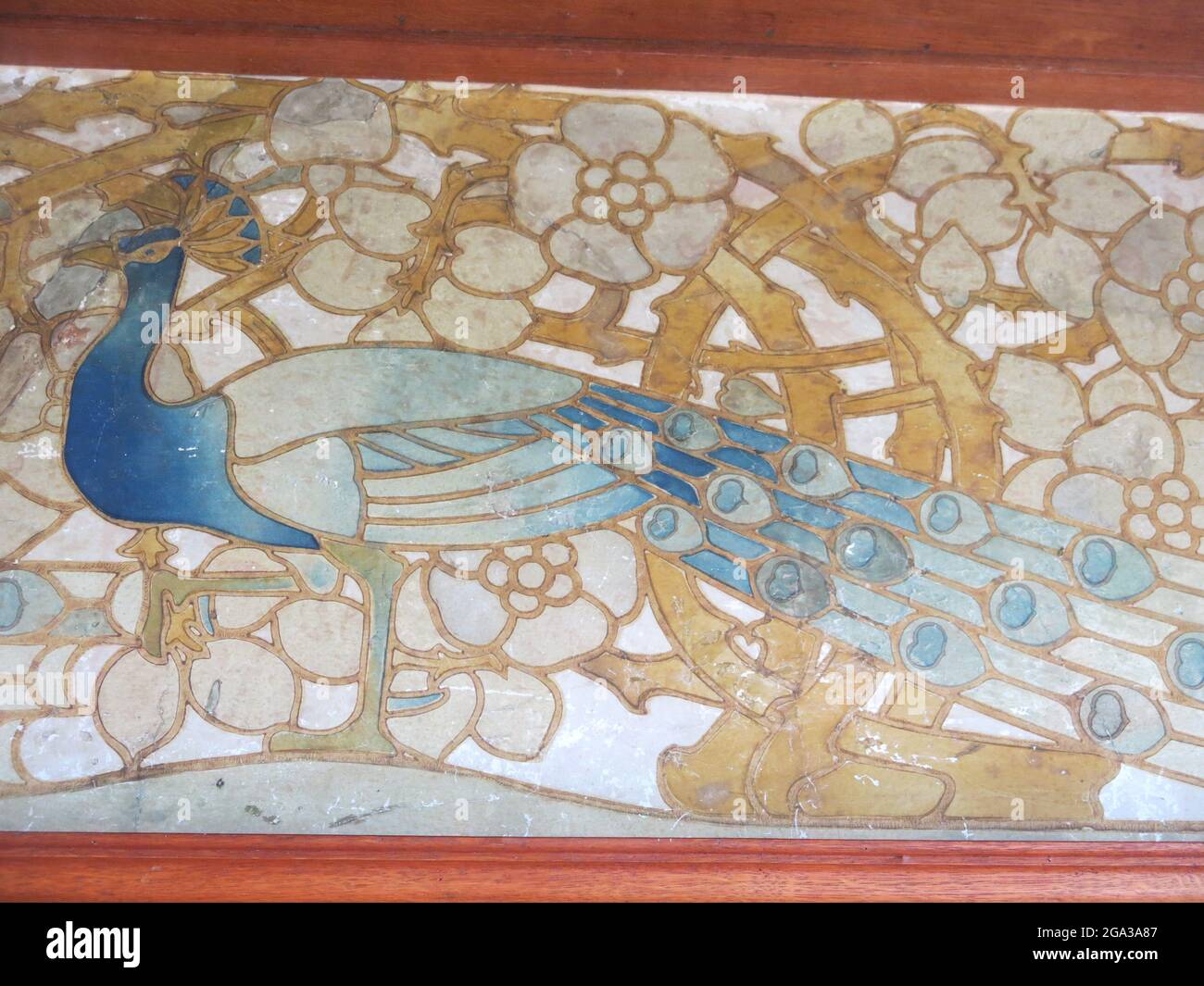 Detail of the Peacock Frieze wallpaper in the Main Hall at Edwardian industrialist Sir Edward