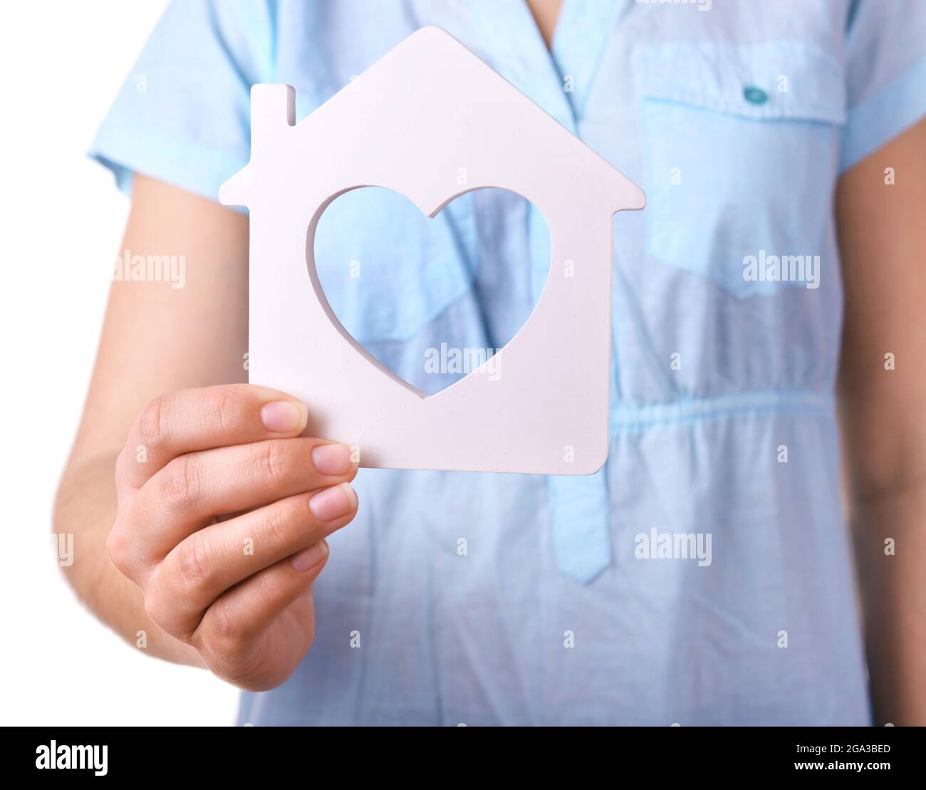 Female hand with small model of house isolated on white Stock Photo - Alamy