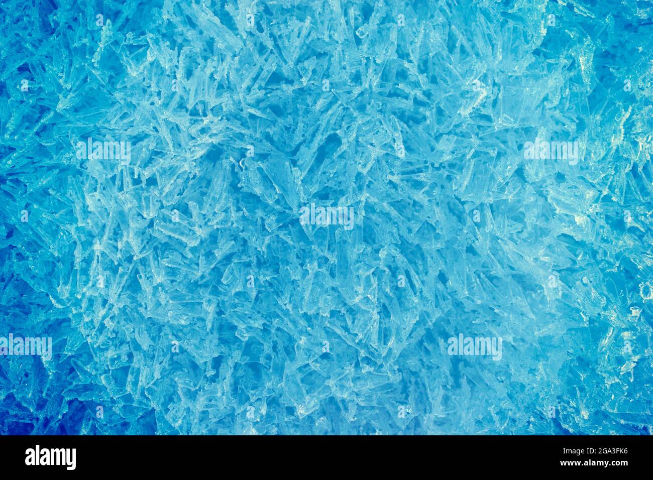 Cool blue bright background of frozen ice crystals. Stock Photo