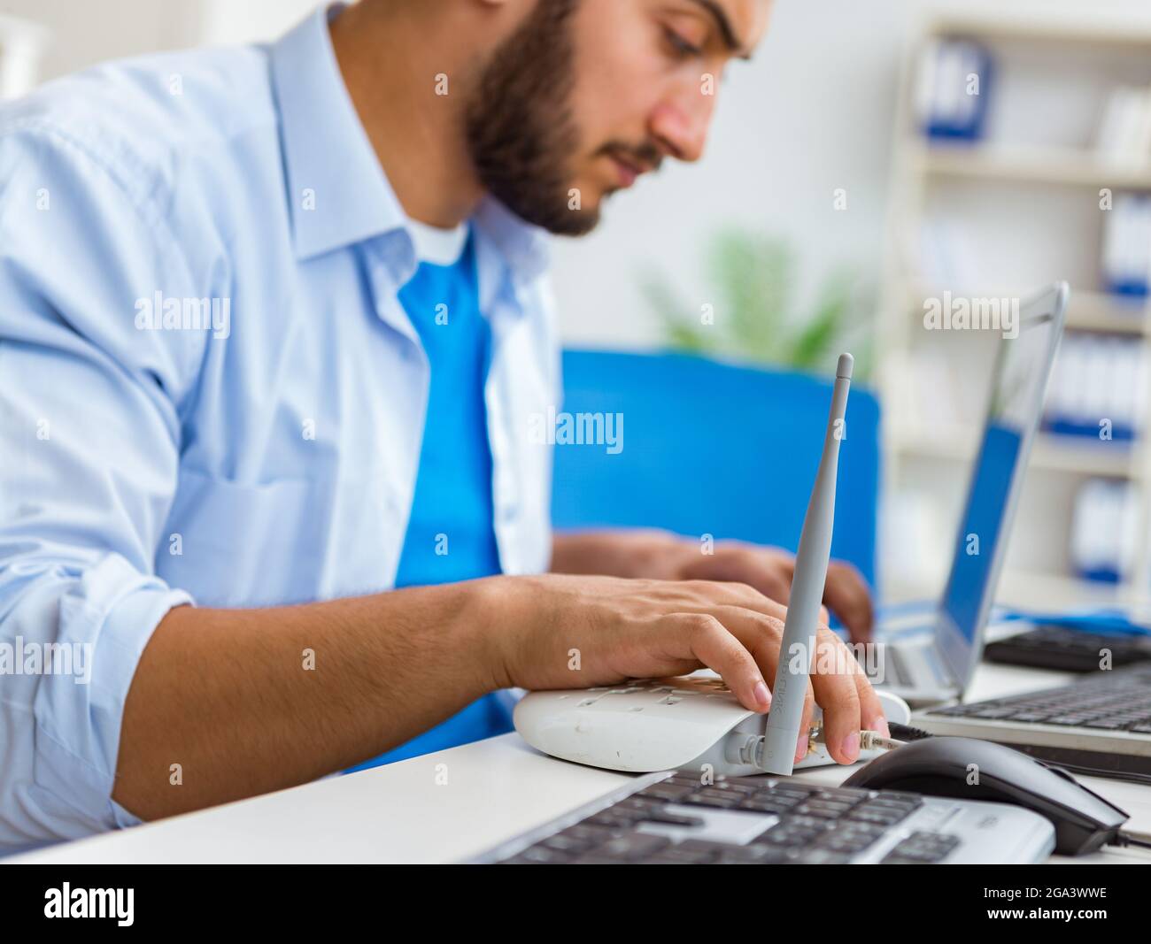 The frustrated young man due to weak internet reception Stock Photo - Alamy