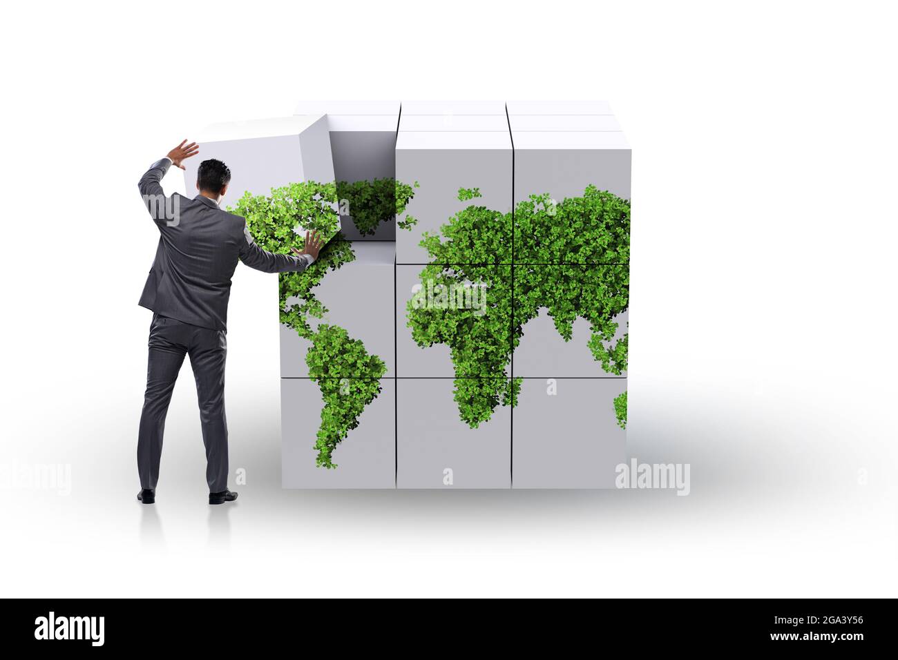 Businessman building world map from the cubes Stock Photo - Alamy