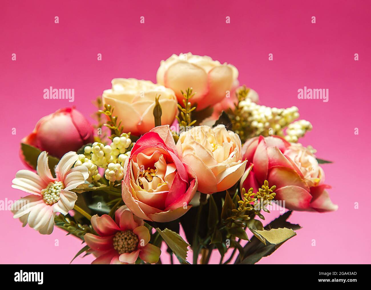 Rustic photo of a bouquet of white and pink peonies flowers on a ...