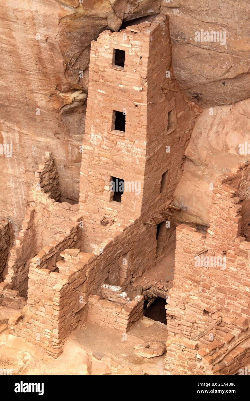 Square Tower House at Mesa Verde National Park near Cortez, Colorado. Many of the ruins located in alcoves in the cliffs at Mesa Verde were inhabited Stock Photo