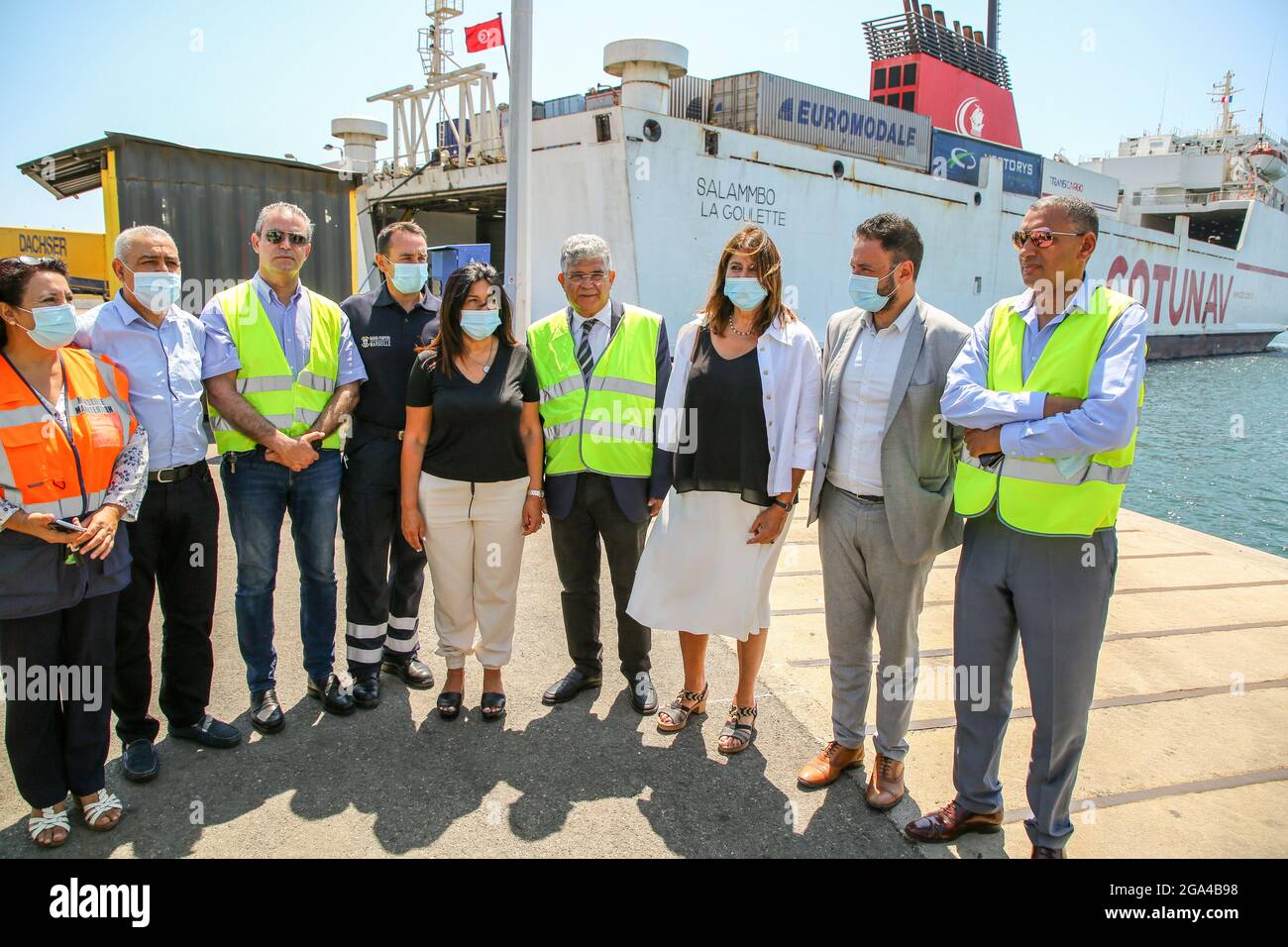 Marseille, France. 28th July, 2021. Elected officials pose for photos at the departure of the equipment. Following the escalation of the covid-19 epidemic in Tunisia, the City of Marseille is sending 225,000 euros of medical equipment to Tunisia intended for Tunisian health structures and front-line health workers who are exposed to the risk of infection. Credit: SOPA Images Limited/Alamy Live News Stock Photo