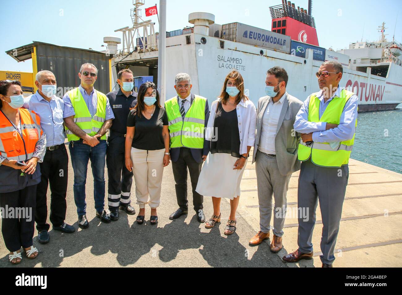 Marseille, France. 28th July, 2021. Elected officials pose for photos at the departure of the equipment. Following the escalation of the covid-19 epidemic in Tunisia, the City of Marseille is sending 225,000 euros of medical equipment to Tunisia intended for Tunisian health structures and front-line health workers who are exposed to the risk of infection. (Photo by Denis Thaust/SOPA Images/Sipa USA) Credit: Sipa USA/Alamy Live News Stock Photo