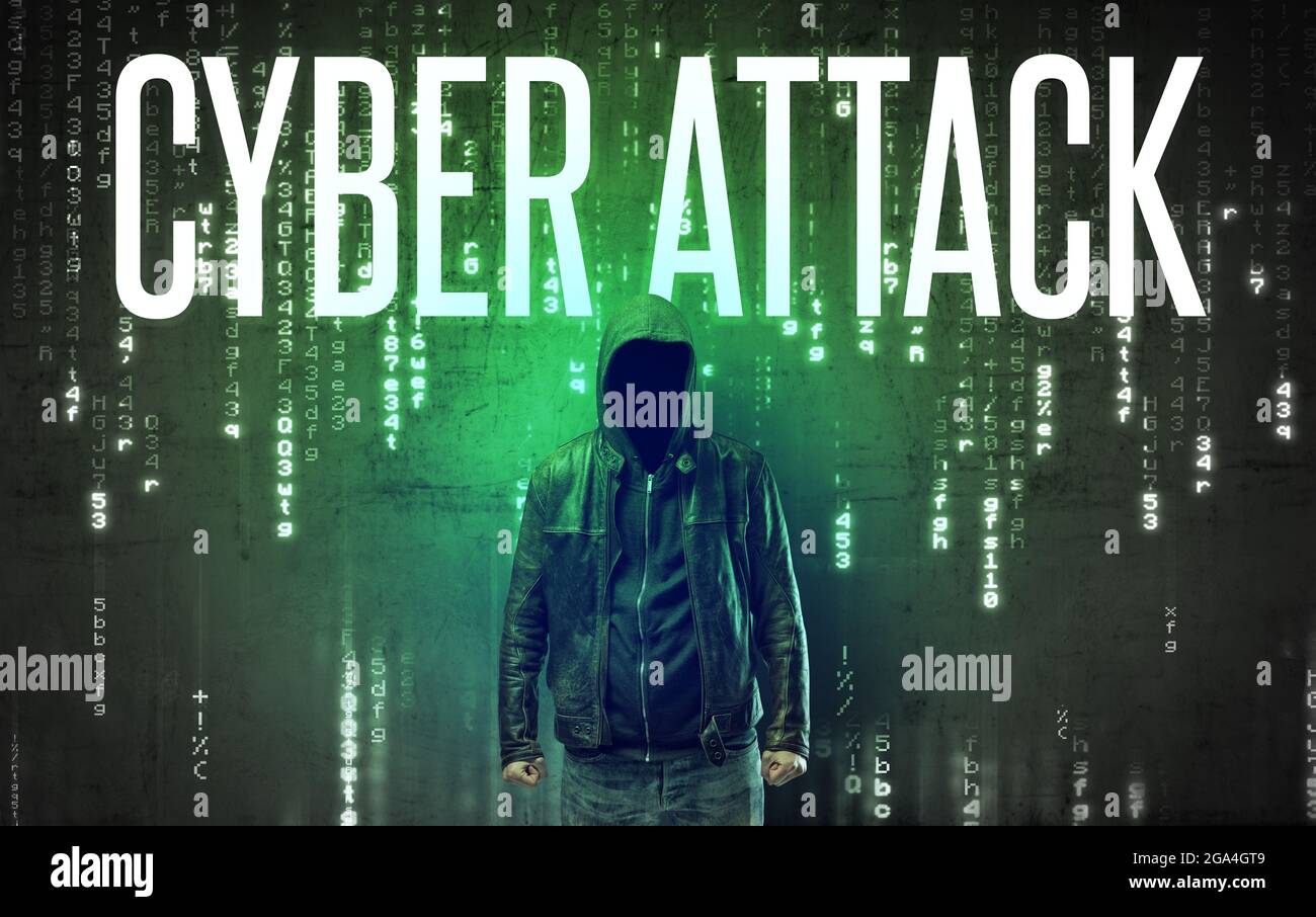 Faceless hacker with inscription Stock Photo