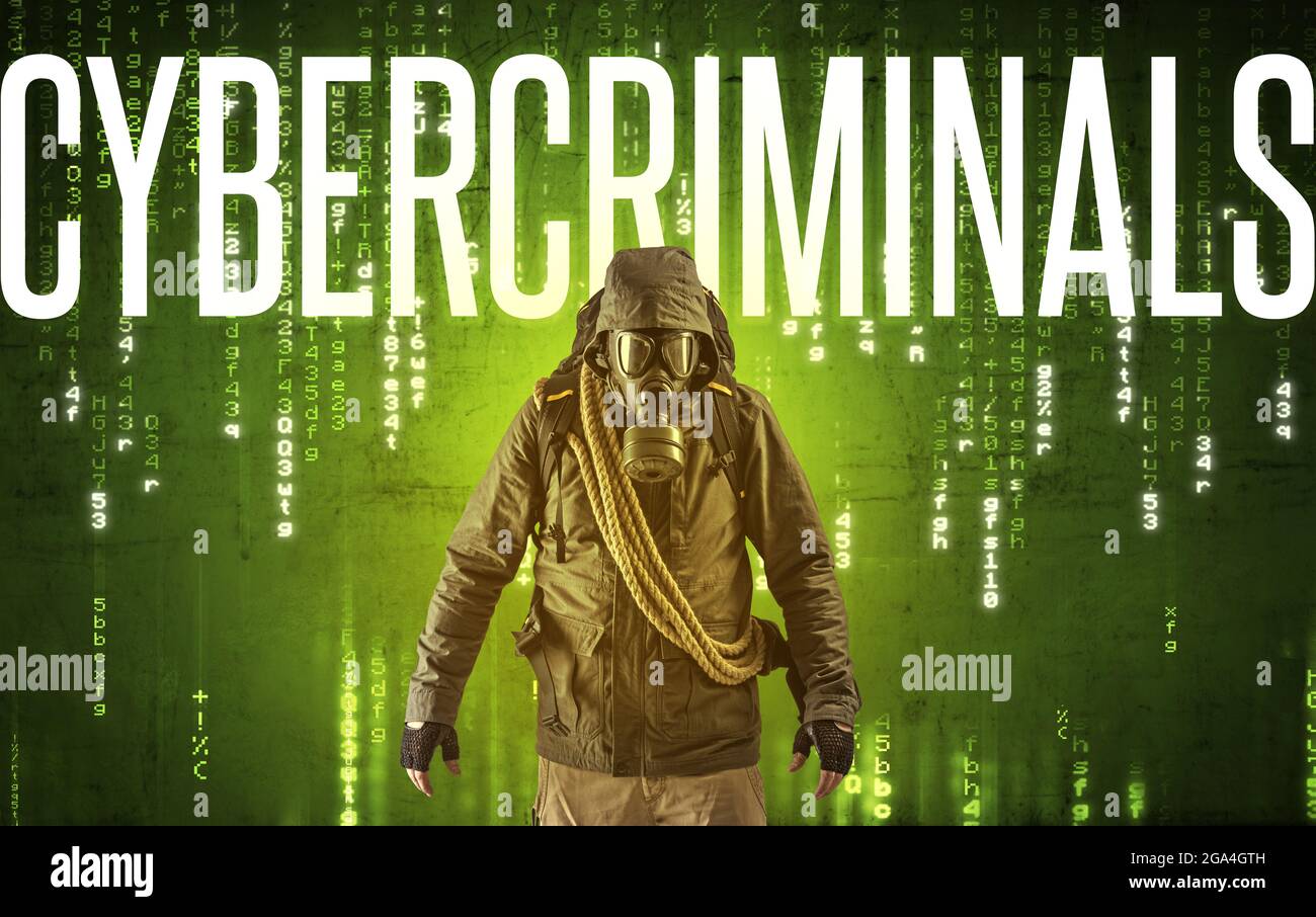 Faceless hacker with inscription Stock Photo