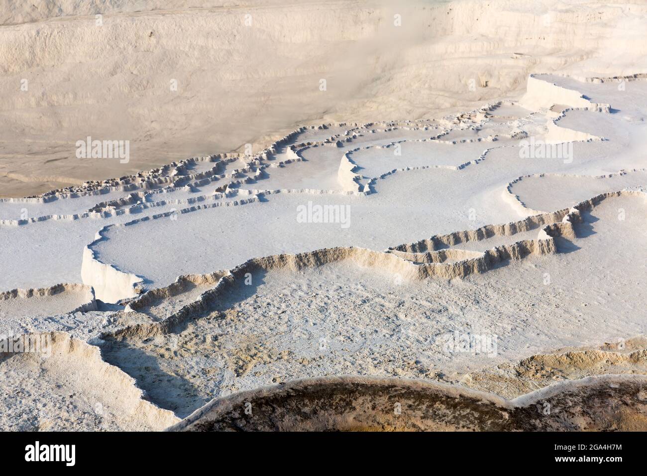 White travertine formations at hot springs of Pamukkale, Turkey Stock ...