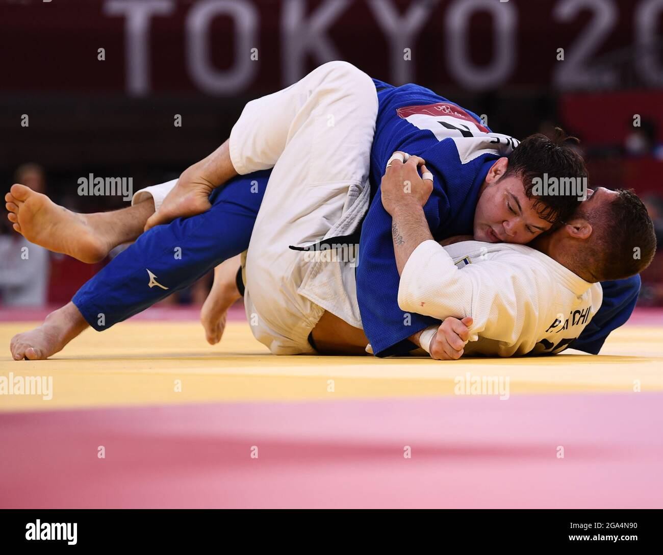 Tokyo 2020 Olympics - Judo - Men's 100kg - Quarterfinal - Nippon Budokan - Tokyo, Japan - July 29, 2021. Peter Paltchik of Israel in action against Aaron Wolf of Japan. REUTERS/Annegret Hilse Stock Photo