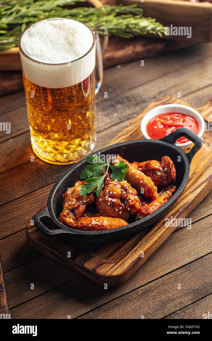 Plate of fried wings in teriyaki sauce Stock Photo