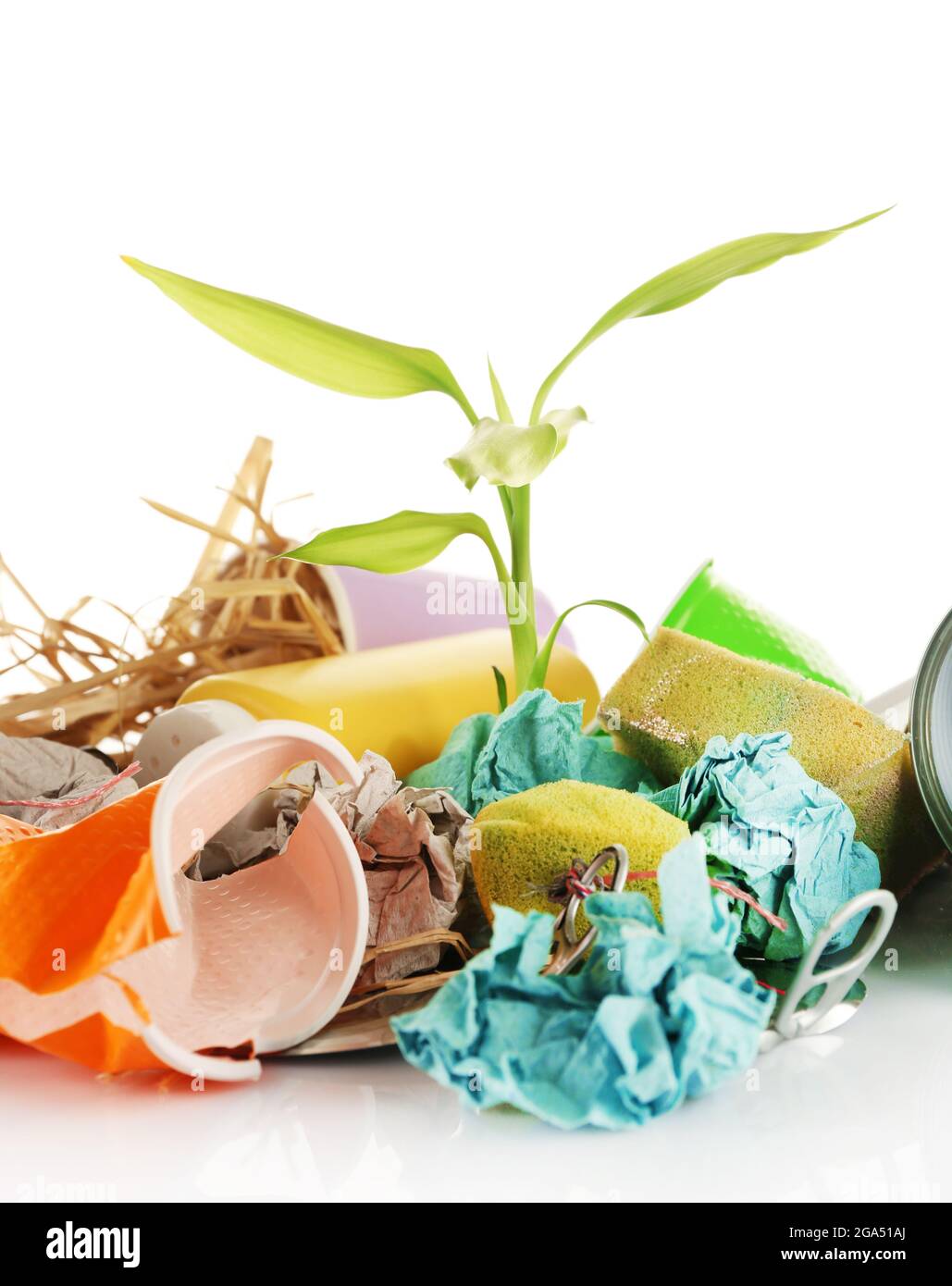 Pile of rubbish with plant isolated on white Stock Photo Alamy