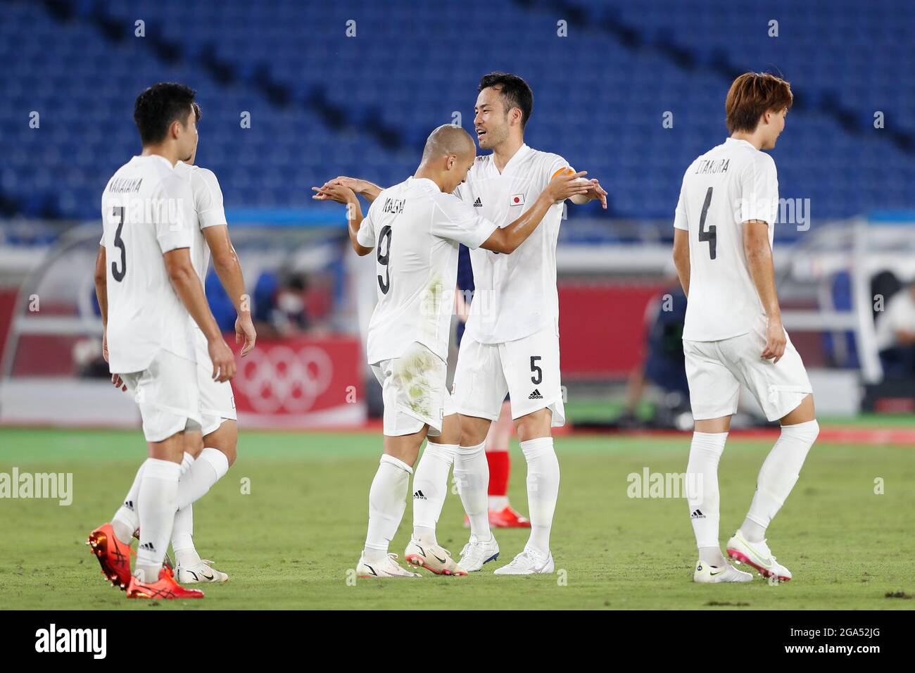 Yokohama, Japan. 28th July, 2021. (L-R) Daizen Maeda, Maya Yoshida (JPN) Football/Soccer : Maeda and Yoshida celebrate after Maeda's goal during Tokyo 2020 Olympic Games Men's football 1st round group A match between France 0-4 Japan at the International Stadium Yokohama in Yokohama, Japan . Credit: Mutsu Kawamori/AFLO/Alamy Live News Stock Photo