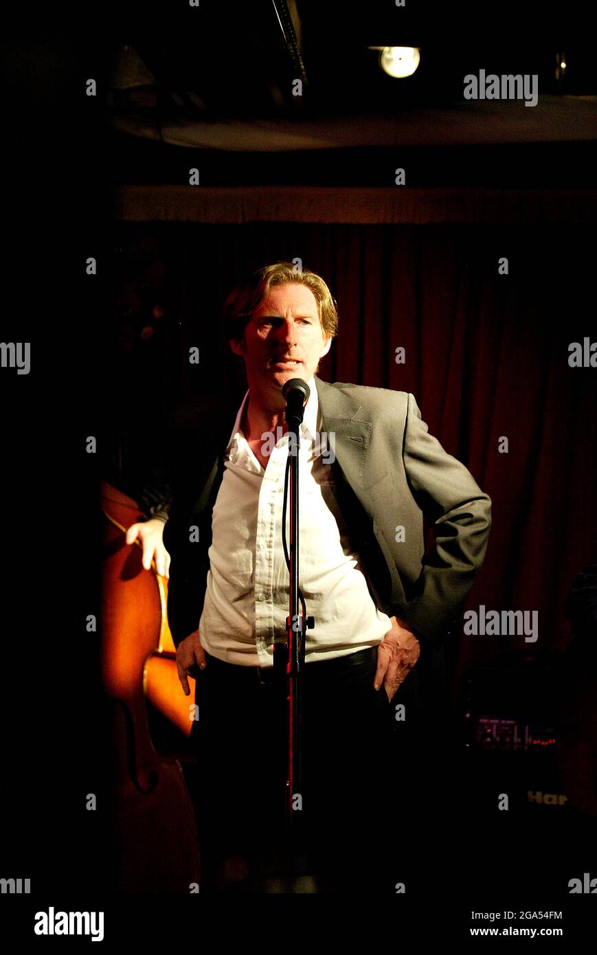 Northern Irish actor and musician Adrian Dunbar preforms at McHughs Bar in Belfast City Centre.  The talented actor also has a successful music career. Stock Photo